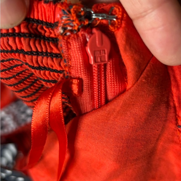 This image features the Free People Bossa Nova Eyelet High Low Dress - Picture 13 of 13